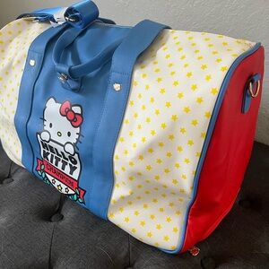 NWT Sanrio Hello Kitty Bioworld Rolling Duffle Bag